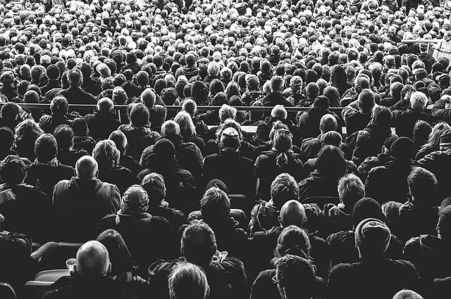 Audience sitting down