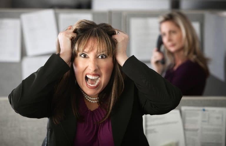Upset woman pulling her hair